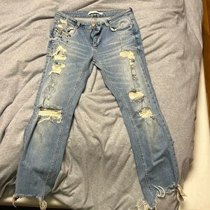 Beautiful embellished distressed jeans with distressed hem ZARA